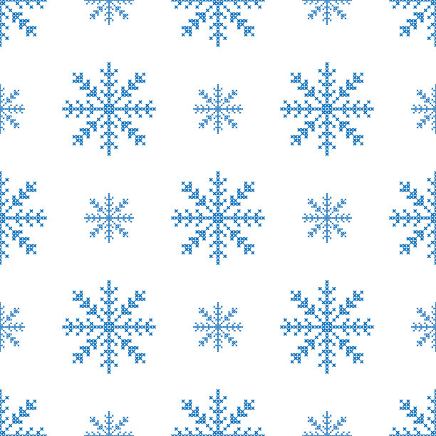 大朵小朵的蓝色雪花的无缝图案在白色的背景上。图片下载