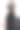 一名年轻女学生戴着黑色口罩以预防冠状病毒感染，穿着黑色夹克和背包。灰色背景上的照片图片下载