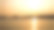 夕阳下的海边城市图片下载