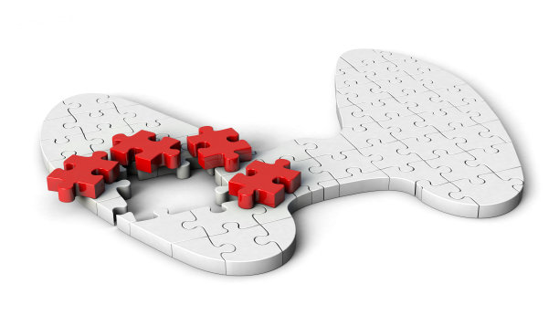 甲状腺形状的拼图。甲状腺形状的拼图3d插图孤立在白色的背景。图片下载