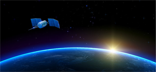 人造卫星在地球上空的外太空飞行图片下载