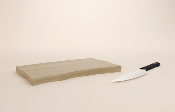 在粉红色背景上的切菜板和刀。图片下载