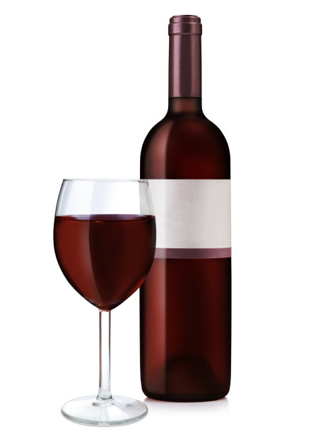 白色背景上的红酒瓶和酒杯。图片下载