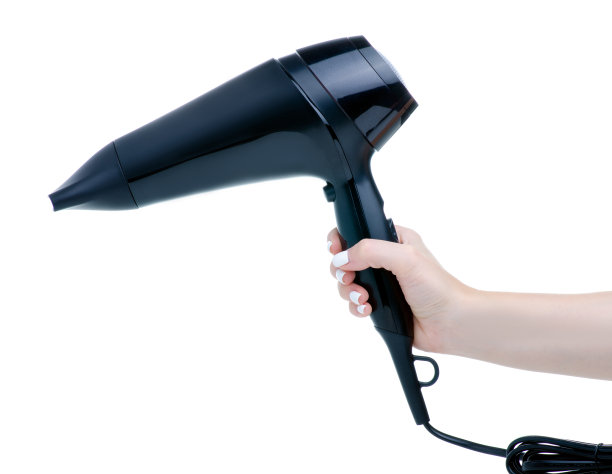 手里拿着黑色的吹风机图片下载