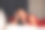 年轻性感漂亮的黑发女人在红色的裙子躺在酒店的床上的特写图片下载