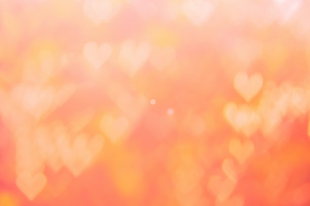 模糊的背景情人节的概念。粉色情人节卡片。色彩柔和，色调柔和，图案有渐变。多色的白、粉、橙、红心形模糊壁纸在爱中明亮性感。图片下载