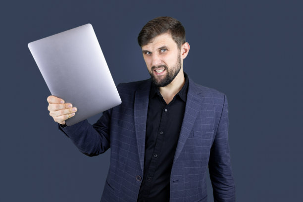 一个留着胡子的男人，穿着蓝色西装的商人图片下载