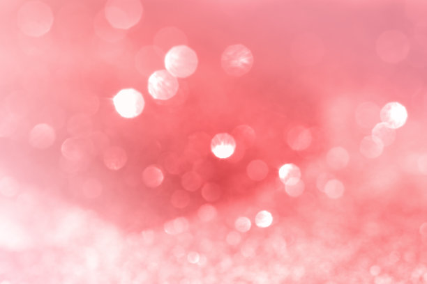 模糊的粉色背景与抽象的散景灯与柔和的灯光背景。图片下载