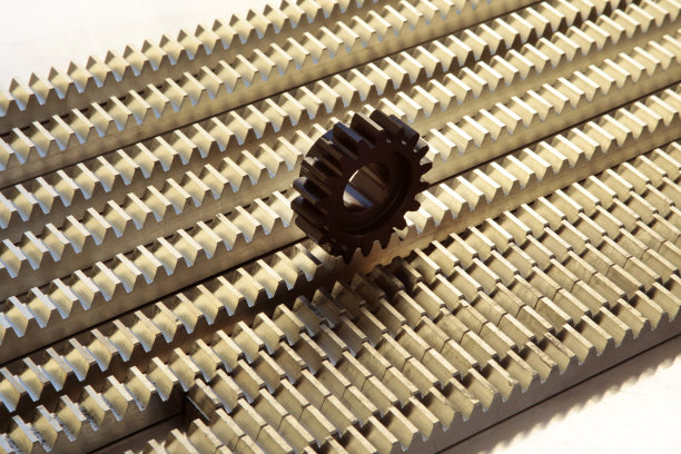 齿轮在轨道上。工业背景。图片下载