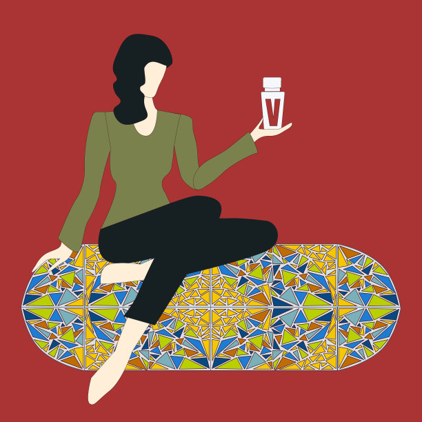 一个女人正坐在马赛克沙发上复印图片下载