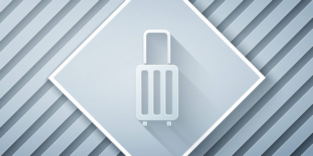 剪纸旅行箱旅行图标孤立在灰色背景。旅行的行李的迹象。旅行的行李图标。纸艺术风格。向量图片下载