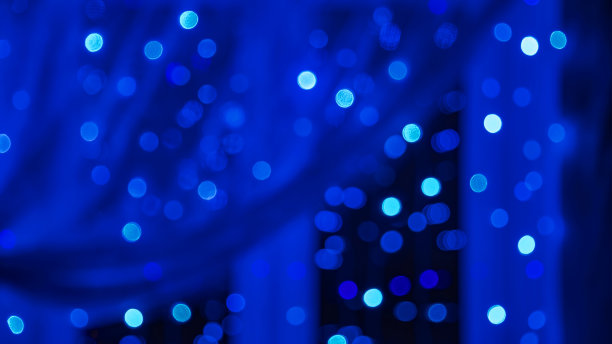 抽象模糊的蓝色色调的光模式图片下载