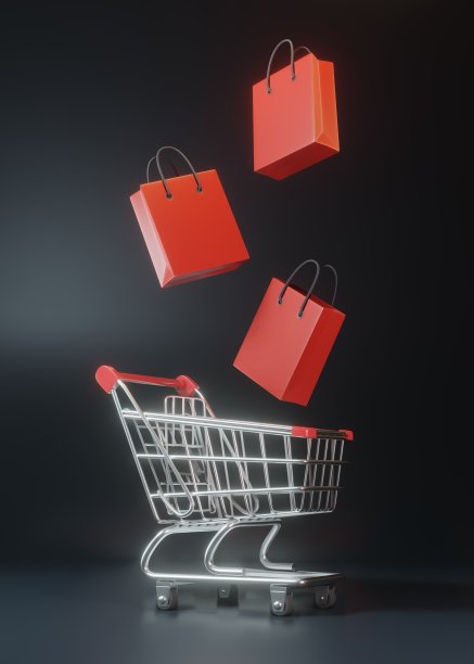 购物车与红色飞行购物袋在黑色的背景图片下载