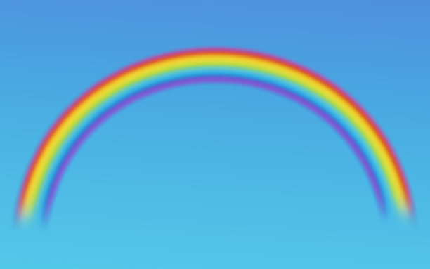 彩虹在蓝色的天空背景图片下载