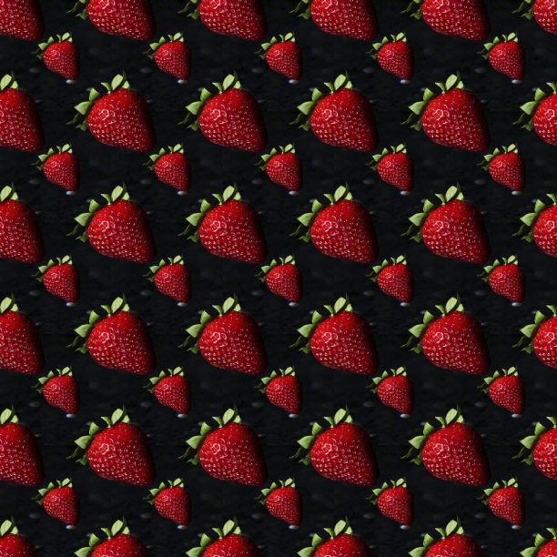 黑色背景上的草莓。成熟的美味的浆果。图案在一个黑暗的背景。图片下载