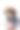混血卷发男孩坐在课桌上用笔记本电脑学习，脸上带着沉思的表情图片下载