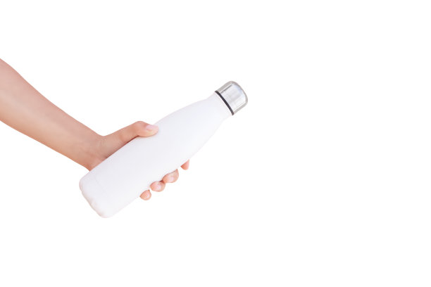 特写握钢可重复使用的热水瓶隔离在白色背景与复制空间。图片下载