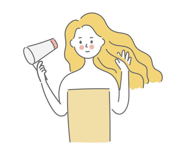 用吹风机吹头发的女人图片下载