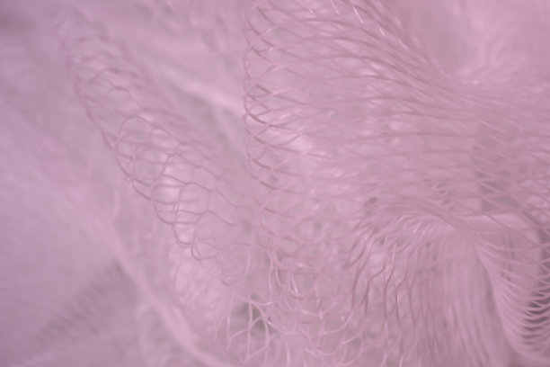 粉色模糊抽象背景。网状结构。墙纸。图片下载