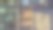 玻璃钢结构多层建筑的窗户，内部灯光明亮，人影穿梭图片下载