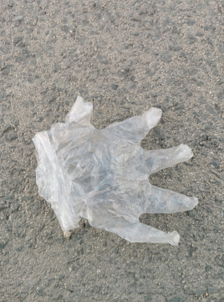 塑胶手套，垃圾，和平地面。图片下载