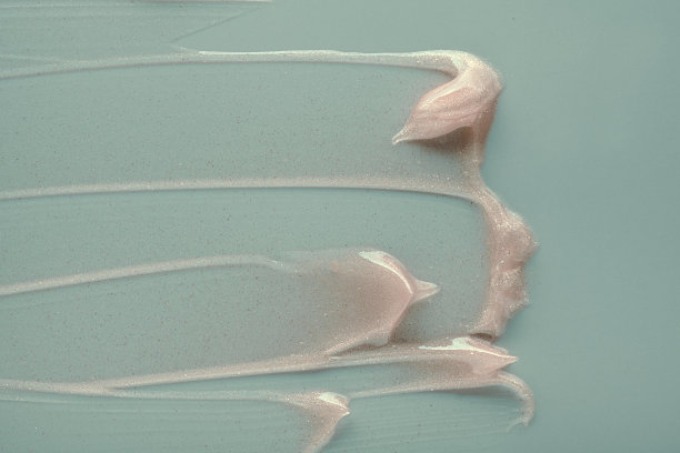 开心果，绿松石绿，紫色，粉红色，蓝色，米色，粘土，丝质光泽霜，高光面膜样品纹理粉底隔离多色背景图片下载