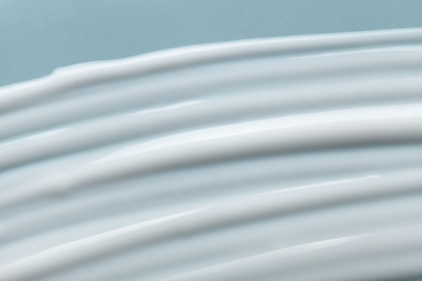 白、绿松石、绿、紫、粉、蓝、米色粘土丝质面膜样品纹理粉底隔离多色背景图片下载