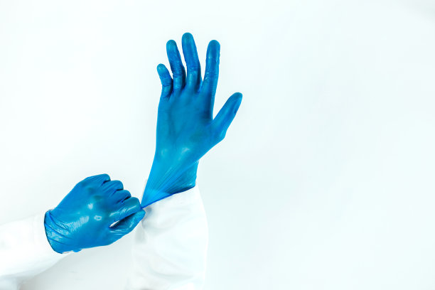 关闭了。医生戴上防护手套图片下载