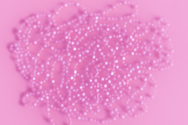 抽象的粉色散焦背景。图片下载