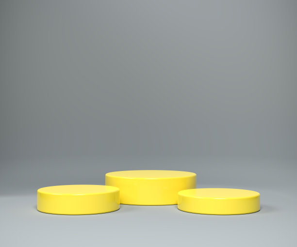 三个不同大小的底座在2021年的颜色照明黄色在最终的灰色无缝背景。图片下载