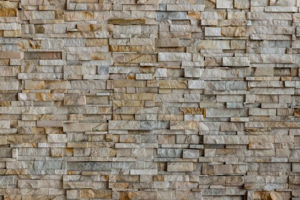 石材墙面纹理背景颜色自然。背景的石墙纹理照片。天然石材墙面纹理为背景。旧砖纹理，垃圾砖墙背景。图片下载