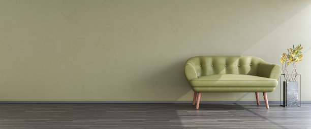 室内模型。绿墙前有一张双人沙发和一棵巴豆树。网页横幅格式与复制空间图片下载