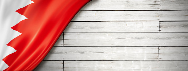 巴林旗在旧白墙旗帜图片下载