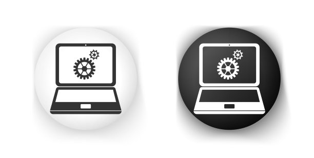 黑白笔记本电脑和齿轮图标隔离开来图片下载