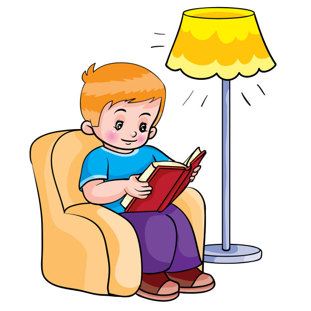 男孩坐在椅子上，旁边读着一本书图片下载