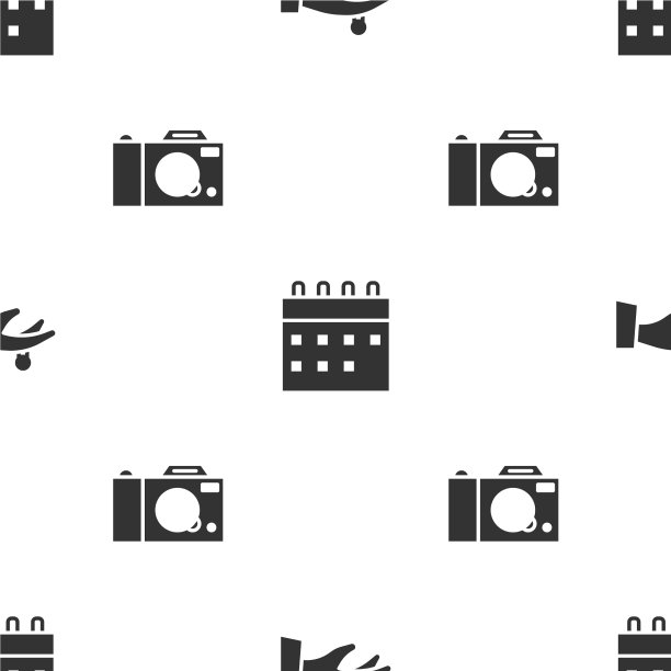 把结婚戒指放在手历和照片上图片下载