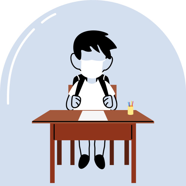 男孩戴着口罩在课桌前图片下载