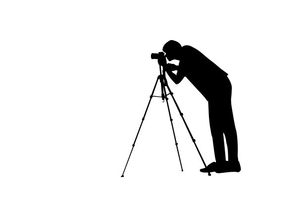 摄影师孤立地站在白色背景上的剪影。图片下载