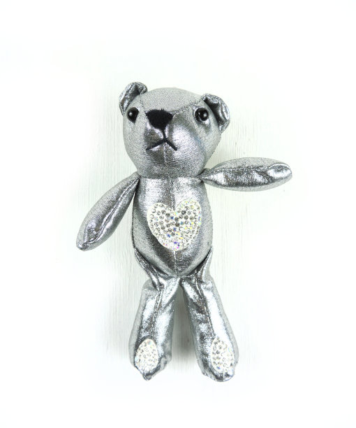 柔软的玩具给孩子一个银色的熊图片下载