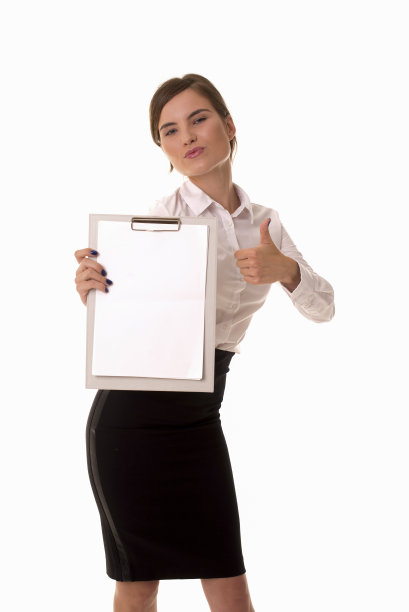 女孩做了个超级手势，拿着平板电脑。图片下载