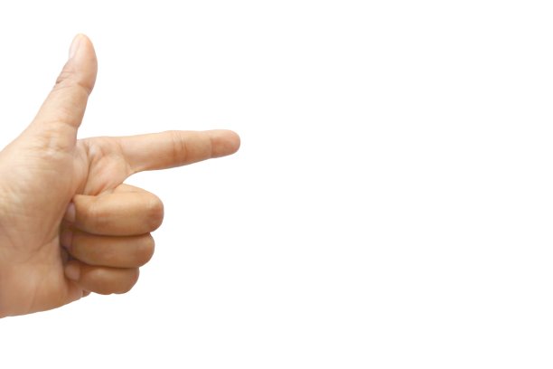 特写女性孤立的食指指向白色背景上的某物图片下载