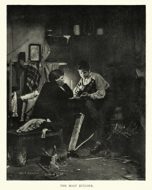 维多利亚时代男孩制作模型船的照片图片下载