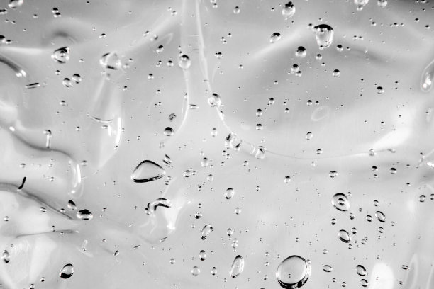 液体膏霜凝胶，绿蓝色化妆品纹理带气泡图片下载