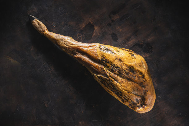 伊比利亚火腿伊比利亚火腿腿黑蹄整个伊比利亚火腿在穆迪的背景图片下载