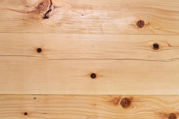 有结的木板全屏上的轻木纹理。图片下载