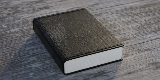 书鳄鱼皮封面木制桌子的背景。三维演示图片下载