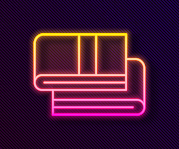 发光的霓虹灯线毛巾堆栈图标孤立的黑色背景。向量图片下载