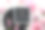 在信纸上写生日快乐。创意平面躺在粉红色和黑色的奶油白色纺织品。派对装饰，纸扇，糖心和香水玻璃瓶图片下载
