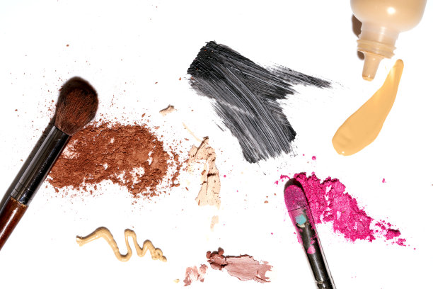 化妆美丽的特写化妆品乱破眼影为艺术。化妆师背景图片下载