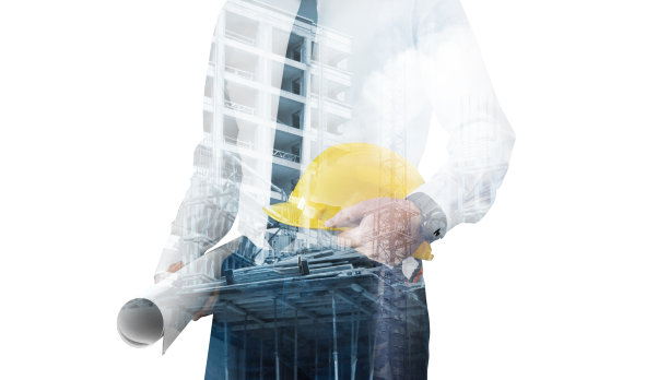 一个土木工程师拿着安全帽和平面图的双重曝光照片图片下载